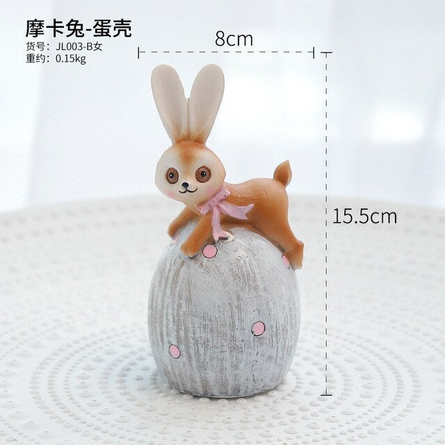 Figurine Lapin Couché Oeuf