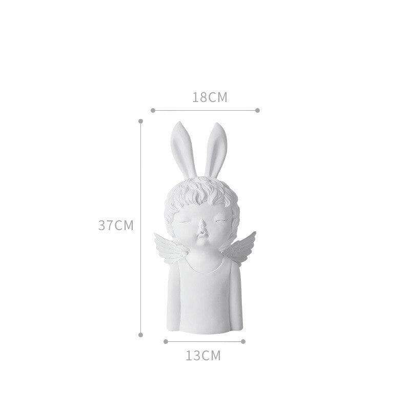 sculpture ange lapin beige
